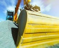 Excavator against blue sky. Motion blur effect Royalty Free Stock Photo