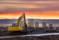 Excavator with attachment for demolishing and recycling concrete material. Crushers tool and Demolition Pulverizer. Concrete Saw, Royalty Free Stock Photo