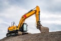 Big excavator in construction site Royalty Free Stock Photo