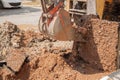 Excavator bucket bulldozer work a hole the repair of pipe Royalty Free Stock Photo