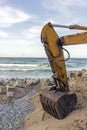 Excavator builds protective gear