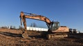 Excavator CASE CX210 working at construction site. Construction machinery for excavating, loading,