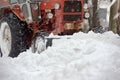 Excavator cleaning road