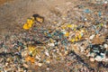 Excavator collects garbage from a landfill for recycling. Ecological catastrophe