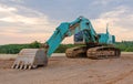 Excavator Construction Equipment Park At Worksite