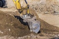 Excavator on construction site during earthworks