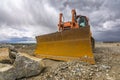 Excavator in a construction site with mud Royalty Free Stock Photo