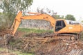 Excavator crawler in site build the pond Royalty Free Stock Photo