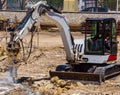 Excavator with demolition hammer