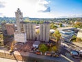 Excavator destroys an abandoned concrete elevator building in Kharkiv, Ukraine