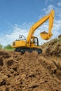 Excavator   are digging canalize the soil in the construction site. Royalty Free Stock Photo