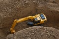 Excavator   are digging canalize the soil. Royalty Free Stock Photo