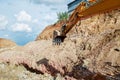 Excavator digging a hole. Earthwork Royalty Free Stock Photo