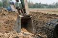 excavator digging making pond. earthmoving work Royalty Free Stock Photo