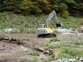 Excavator dredge a river Royalty Free Stock Photo