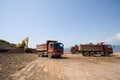 Excavator & dump trucks