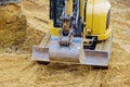 Excavator on earthwork during the foundation construction Royalty Free Stock Photo