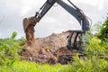 Excavator Empting Dug Dirt Royalty Free Stock Photo