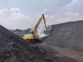 The excavator extinguish fires from coal spontaneous combustion