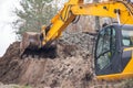 Excavator during work in countryside Royalty Free Stock Photo
