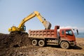 Excavator and heavy dump truck Royalty Free Stock Photo