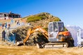 Excavator Hitachi in mountains, Krasnaya Polyana, Sochi