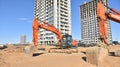 Excavator HITACHI ZAXIS 200 working at construction site. Construction machinery for excavating,