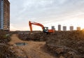 Excavator HITACHI ZAXIS 200 working at construction site. Construction machinery for excavating,