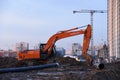 Excavator HITACHI ZAXIS 200 working at construction site. Construction machinery for excavating,