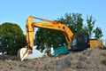 Excavator HYUNDAI R250LC-7 working at construction site. Construction machinery for excavation,