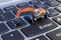 Excavator on laptop keyboard, 3D rendering