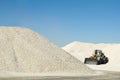 Excavator in a limestone quarry