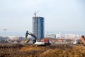 Excavator load the sand to the dump truck on construction site. Royalty Free Stock Photo