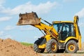 Excavator Loader with backhoe works Royalty Free Stock Photo