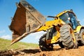 Excavator Loader with backhoe works Royalty Free Stock Photo