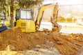 Excavator loader at earth moving works Royalty Free Stock Photo