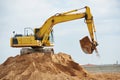 Excavator loader at earthmoving works