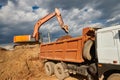 Excavator loader machine at construction site Royalty Free Stock Photo