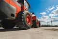 Excavator Loader Machine. Side View of Front Hoe Loader. Industrial Vehicle. Heavy Equipment Machine. Pneumatic Truck. Constructio Royalty Free Stock Photo