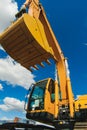 Excavator Loader Machine. Side View of Front Hoe Loader. Industrial Vehicle. Heavy Equipment Machine. Pneumatic Truck Royalty Free Stock Photo