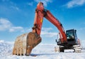 Excavator loader machine at winter construction site Royalty Free Stock Photo