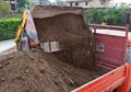Excavator loading dumper truck tipper