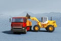 Excavator loading gravel on truck