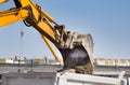 Excavator loading truck at building site Royalty Free Stock Photo