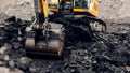 Excavator loads coal into the back of a heavy mining dump truck. Royalty Free Stock Photo