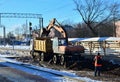 excavator loads crushed stone in a dump truck body. Construction of the railway. Preparing the surface of the earth for laying Royalty Free Stock Photo