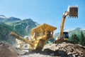 Excavator and stone crusher machine. scalper at work Royalty Free Stock Photo