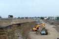 Excavator loads soil into the truck top view - Amazing Style