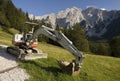 Excavator in the mountains