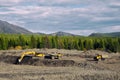 Excavator in the mountains of Eastern Siberia / Earthworks / Mining Royalty Free Stock Photo